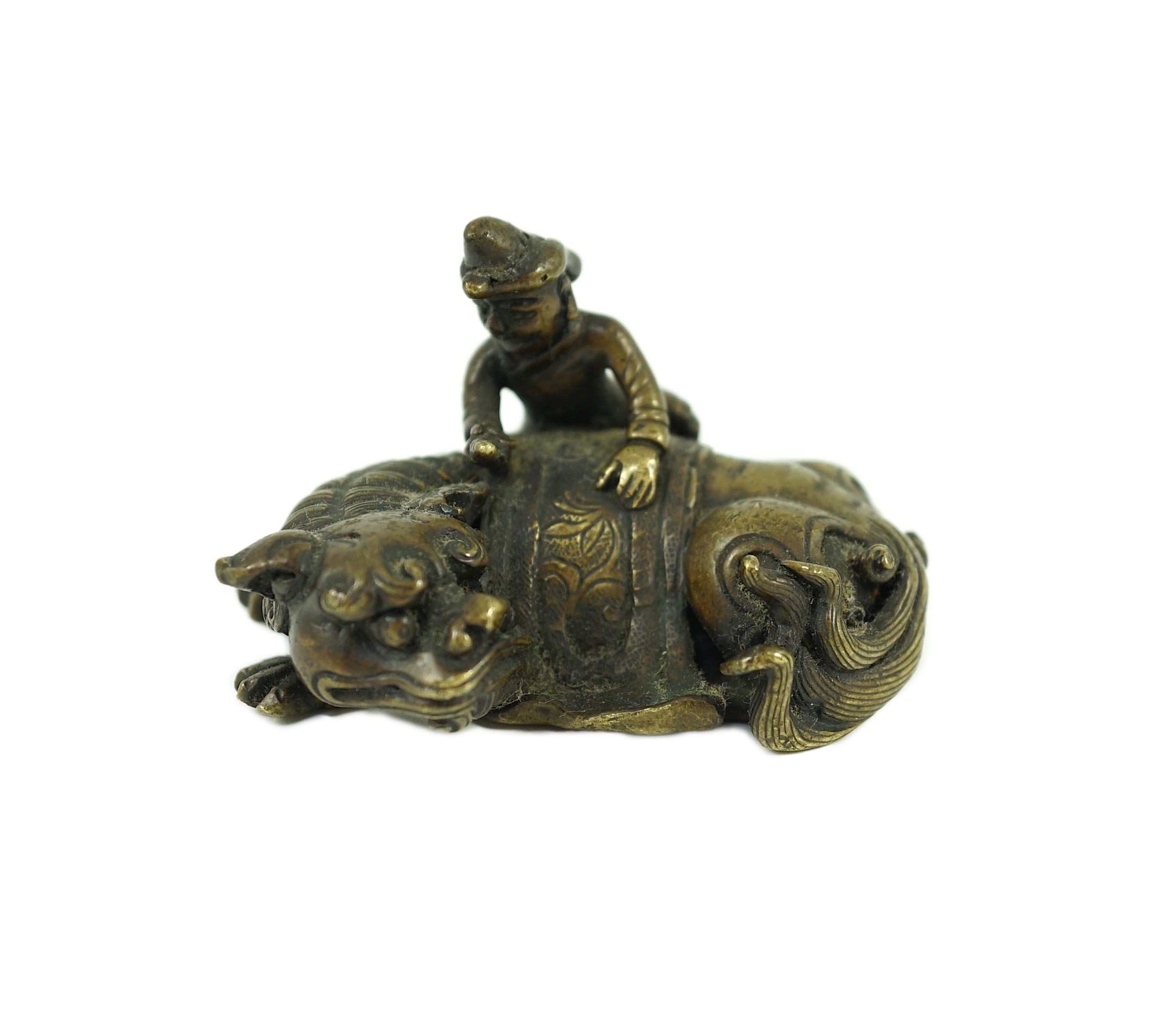 A Chinese bronze ‘Buddhist lion’ scroll weight, 17th/18th century, 6.5cm long